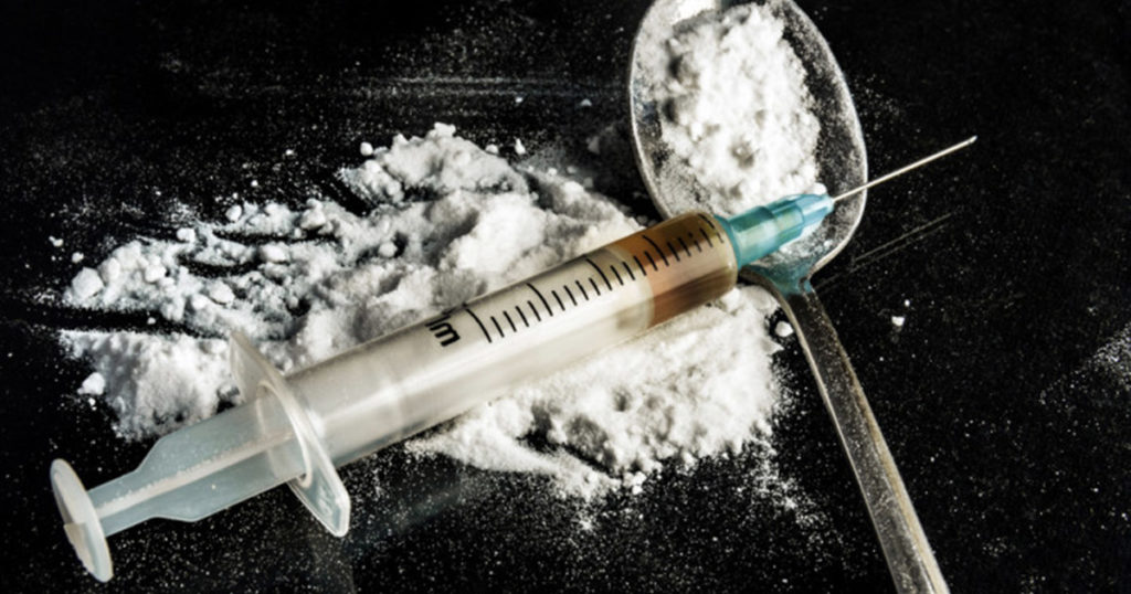 What are the signs of heroin addiction?